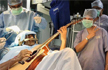 Man plays the Guitar as doctors operate upon his brain in Bengaluru